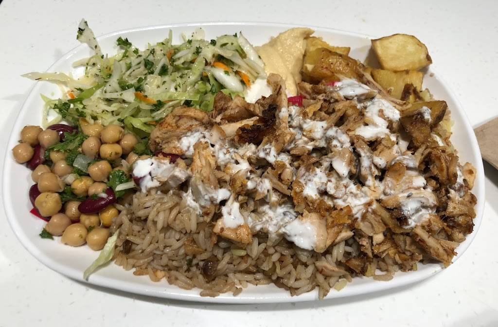 Villa Madina | restaurant | 100 City Centre Dr, Square One Dr, Mississauga, ON L5B 2C9, Canada | 9052763866 OR +1 905-276-3866