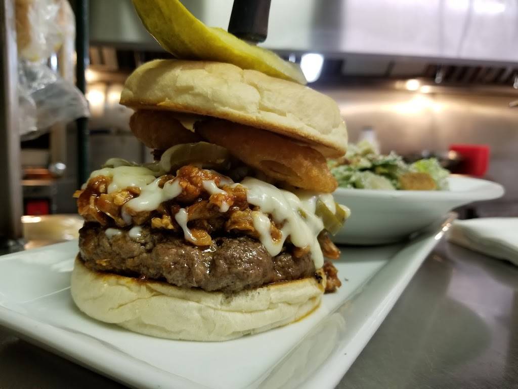 Crave Family Grill & Pub | restaurant | 26 Erie St N, Leamington, ON N8H 2Z2, Canada | 5193220032 OR +1 519-322-0032