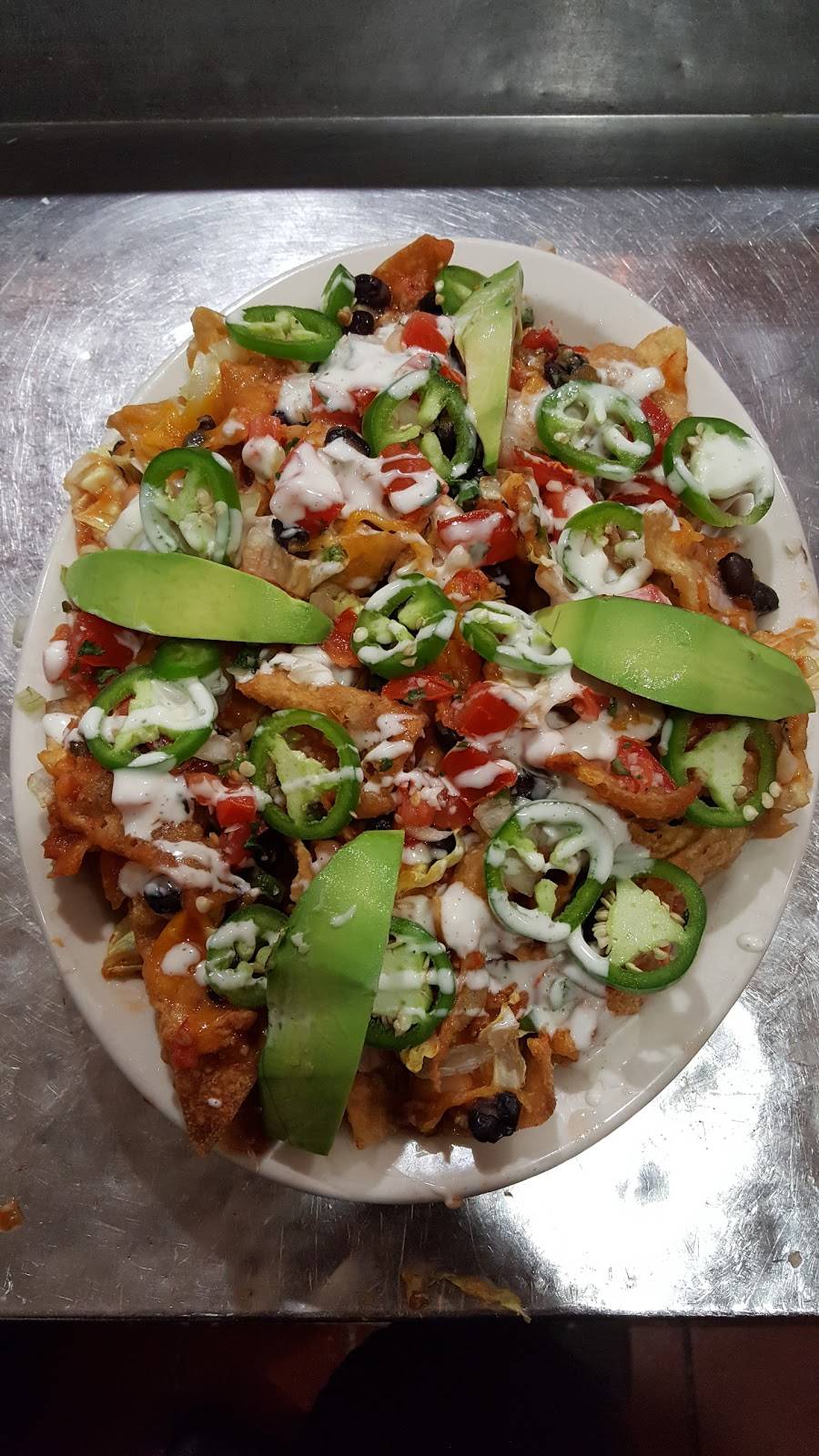 Johnny Carinos | restaurant | 1516 Centre Pl Dr, Denton, TX 76205, USA | 9408980990 OR +1 940-898-0990