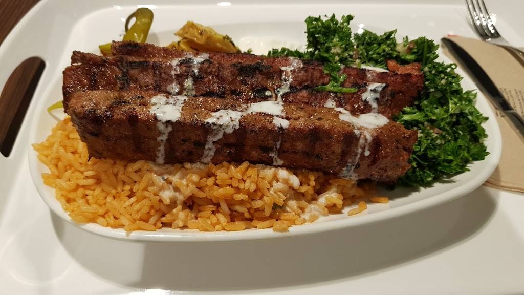 Villa Madina | restaurant | 100 City Centre Dr, Square One Dr, Mississauga, ON L5B 2C9, Canada | 9052763866 OR +1 905-276-3866