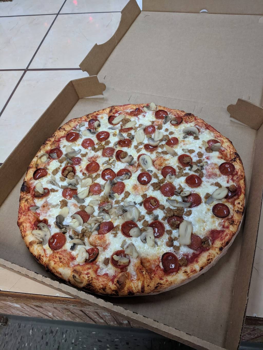 Ninos Pizzeria | restaurant | 26 Market St, Attica, NY 14011, USA | 5855910745 OR +1 585-591-0745