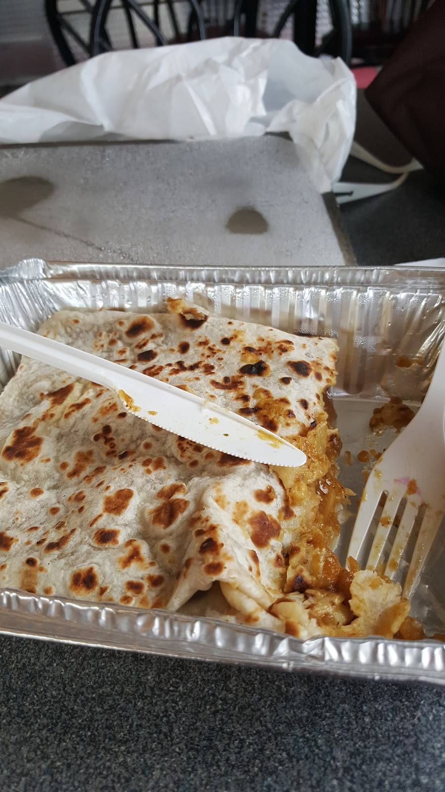 Roti Time | restaurant | 2542 St Clair Ave W, York, ON M6N 1L7, Canada | 4169018311 OR +1 416-901-8311