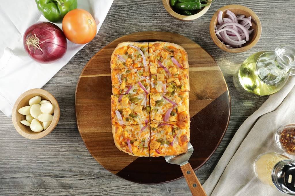 Pizza Twist | restaurant | 901 W Royal Ln Suite 100, Irving, TX 75039, USA | 4695990059 OR +1 469-599-0059