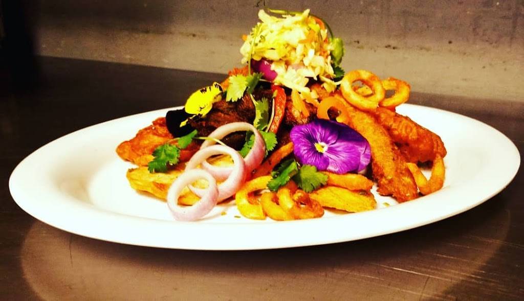 Kizin Creole Restaurant | restaurant | 2311 Howard St, Chicago, IL 60645, USA | 7739617275 OR +1 773-961-7275