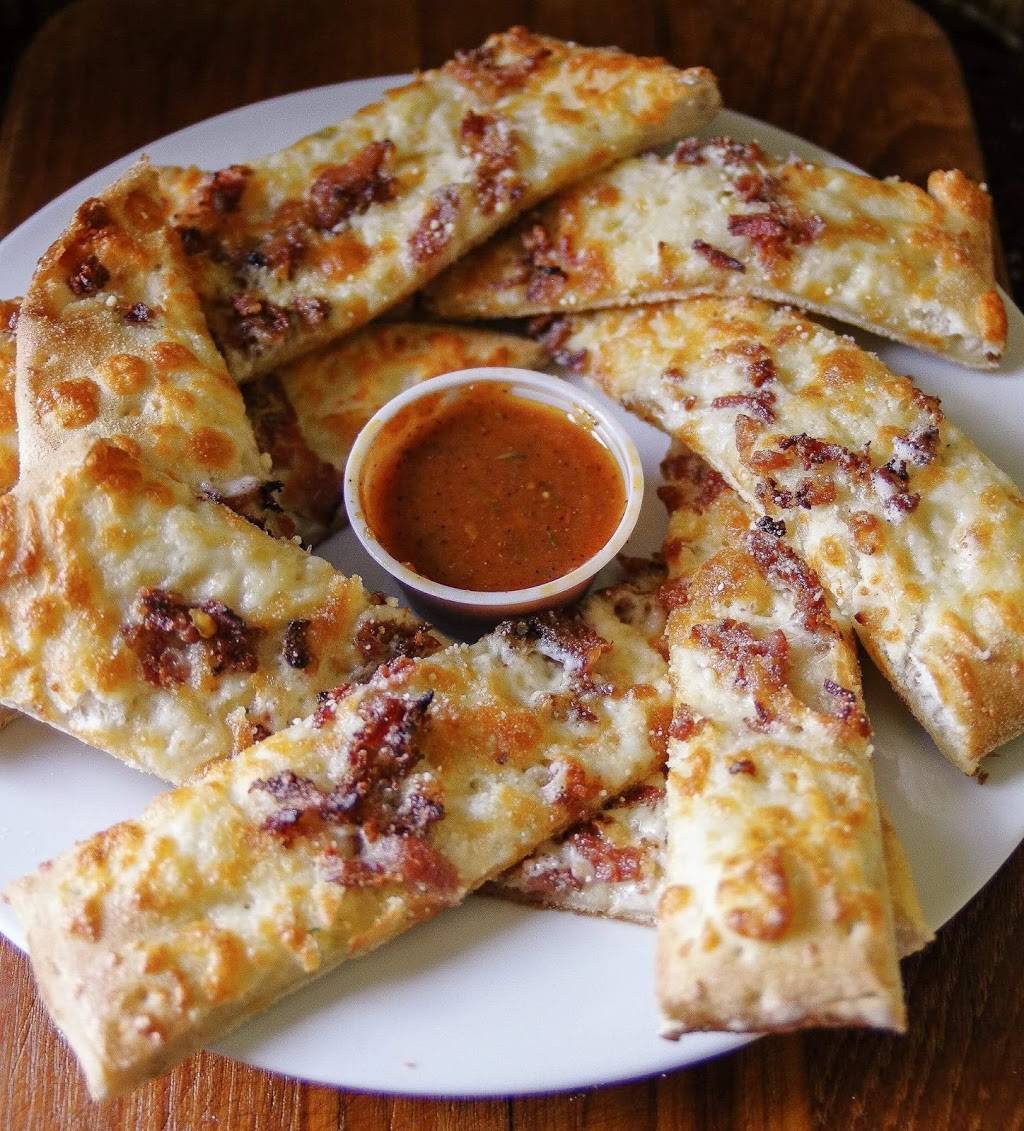 Pizzaria Unlimited | restaurant | 27 Bridge St, Almonte, ON K0A 1A0, Canada | 6134616161 OR +1 613-461-6161