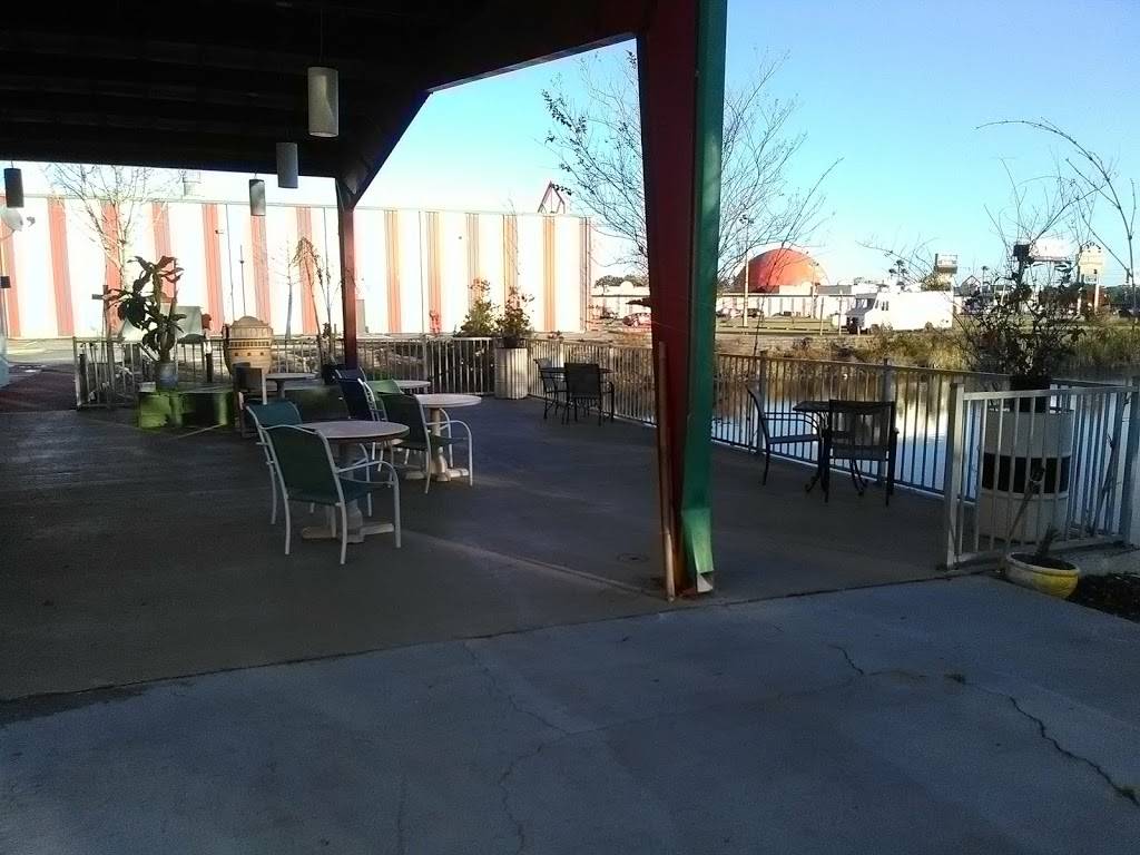 Caribbean Jerk & Grille. Food Court- Bld D. | restaurant | 5407 W Irlo Bronson Memorial Hwy, Kissimmee, FL 34746, USA | 4074651353 OR +1 407-465-1353