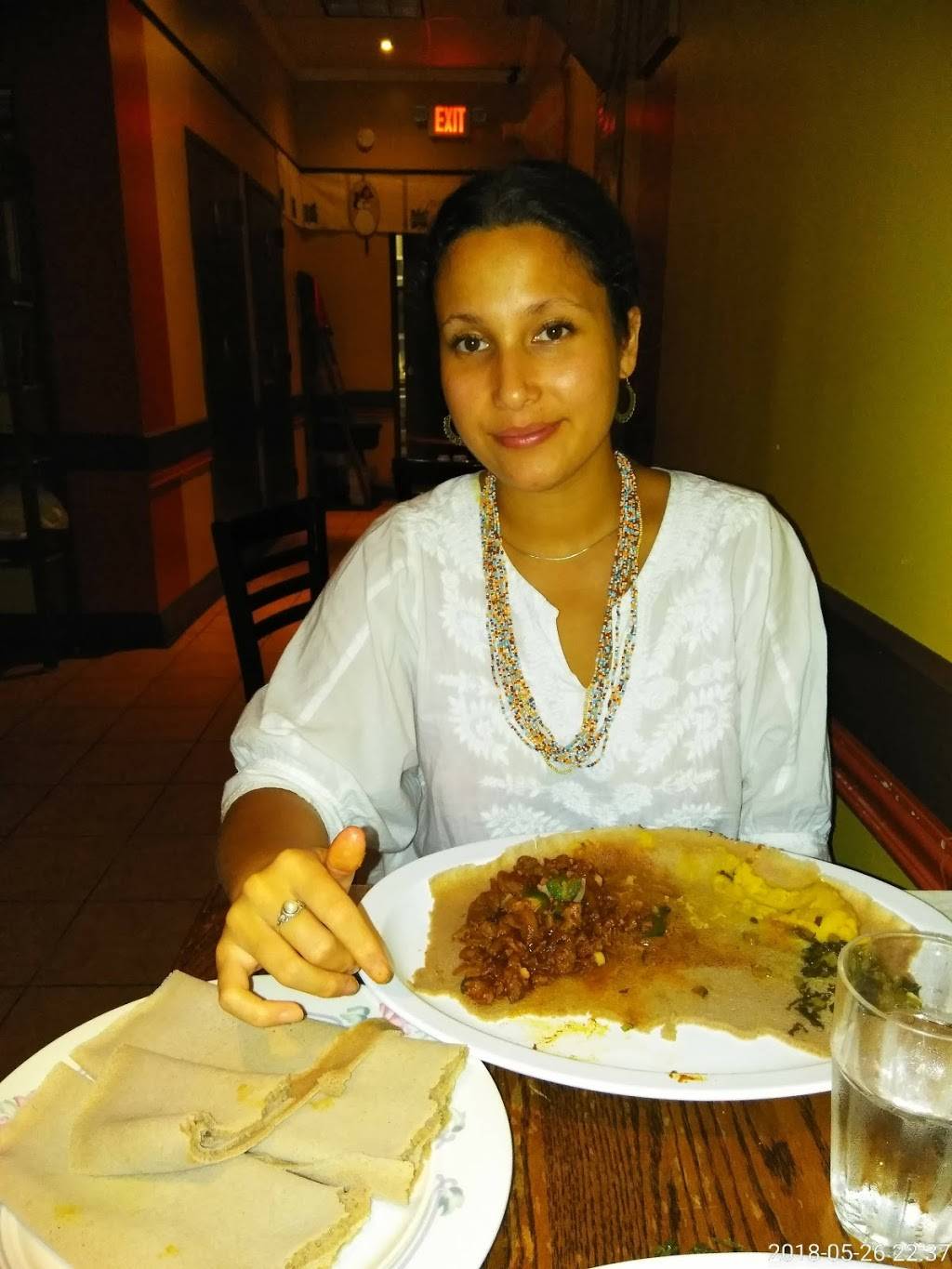 Kaffa Crossing Ethiopian Restaurant, Bar & Cafe | restaurant | 4421 Chestnut St, Philadelphia, PA 19104, USA | 2153860504 OR +1 215-386-0504