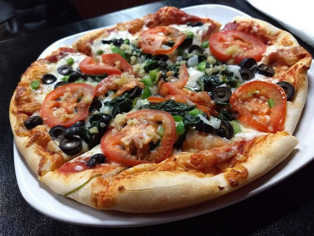 Falcones Pizzeria | restaurant | 6705 N May Ave, Oklahoma City, OK 73116, USA | 4052422222 OR +1 405-242-2222