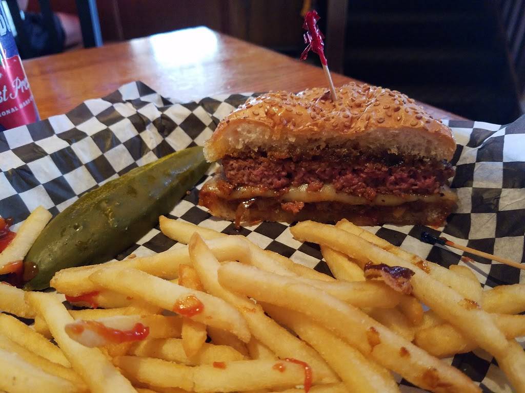 Hooligans Super Bar | restaurant | 2017 E North Ave, Milwaukee, WI 53202, USA | 4142735230 OR +1 414-273-5230