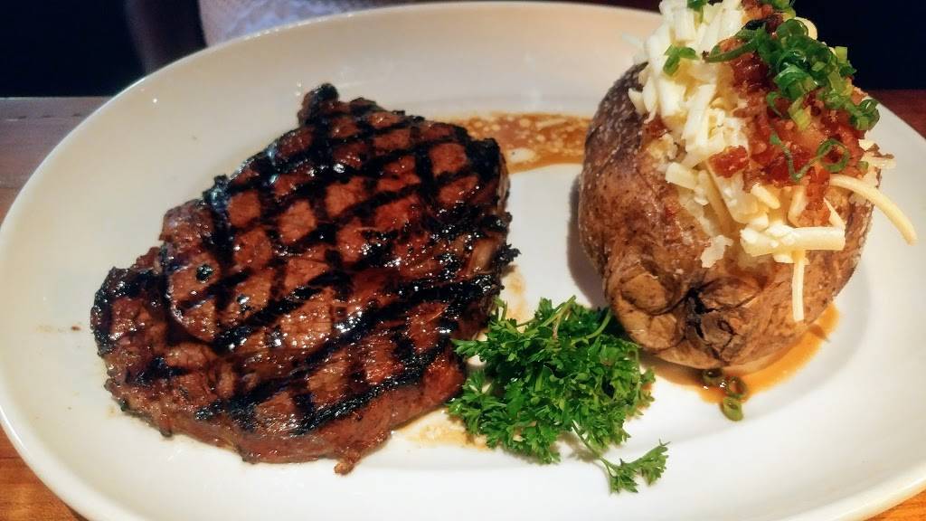 Woodmont Grill | restaurant | 7715 Woodmont Ave, Bethesda, MD 20814, USA | 3016569755 OR +1 301-656-9755