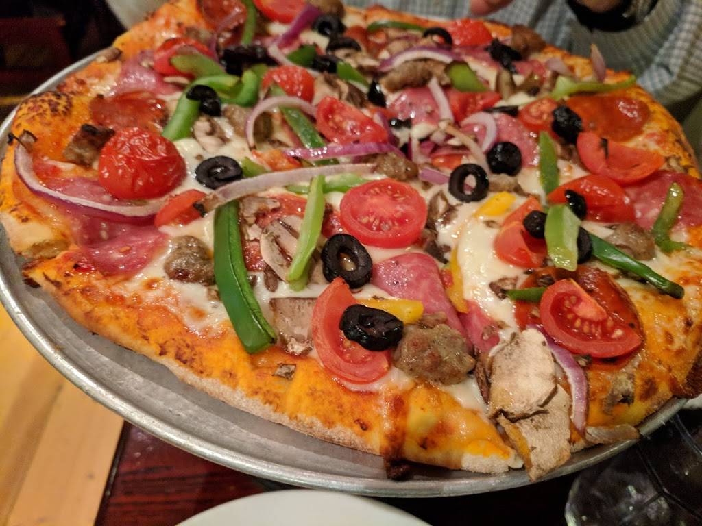 Village Pizza & Grill | restaurant | 403 G St, Davis, CA 95616, USA | 5307500100 OR +1 530-750-0100