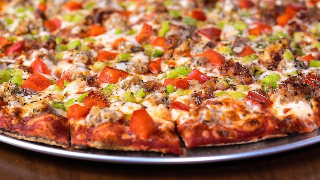 Monicals Pizza | restaurant | 909 18th St, Charleston, IL 61920, USA | 2173487515 OR +1 217-348-7515