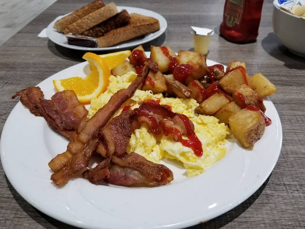 The Vaughan City Grill | restaurant | 211 Marycroft Ave #4A, Woodbridge, ON L4L 5X9, Canada | 9058566122 OR +1 905-856-6122