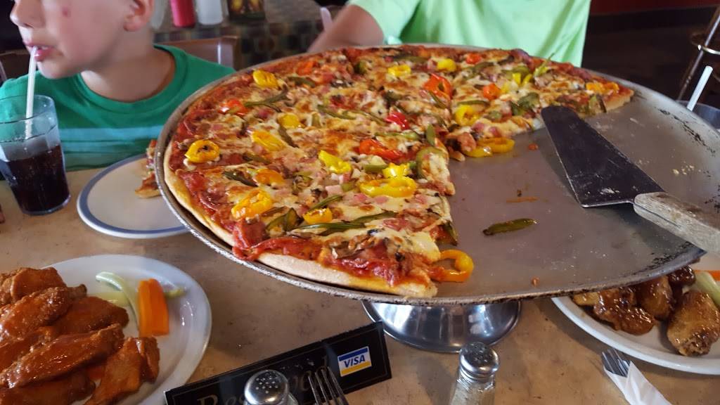 Village Restaurant & Pizzeria | restaurant | 12 Main St W, Norwich, ON N0J 1P1, Canada | 5198632813 OR +1 519-863-2813