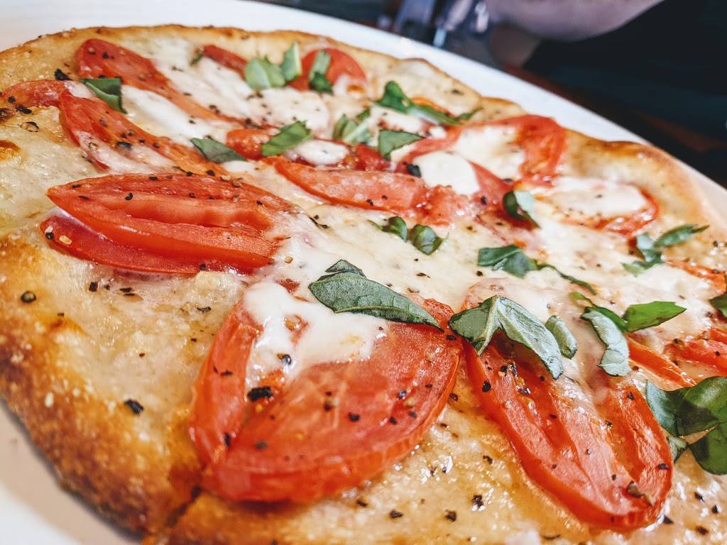 Carrabbas Italian Grill | restaurant | 10075 Gulf Center Dr, Fort Myers, FL 33913, USA | 2396902426 OR +1 239-690-2426