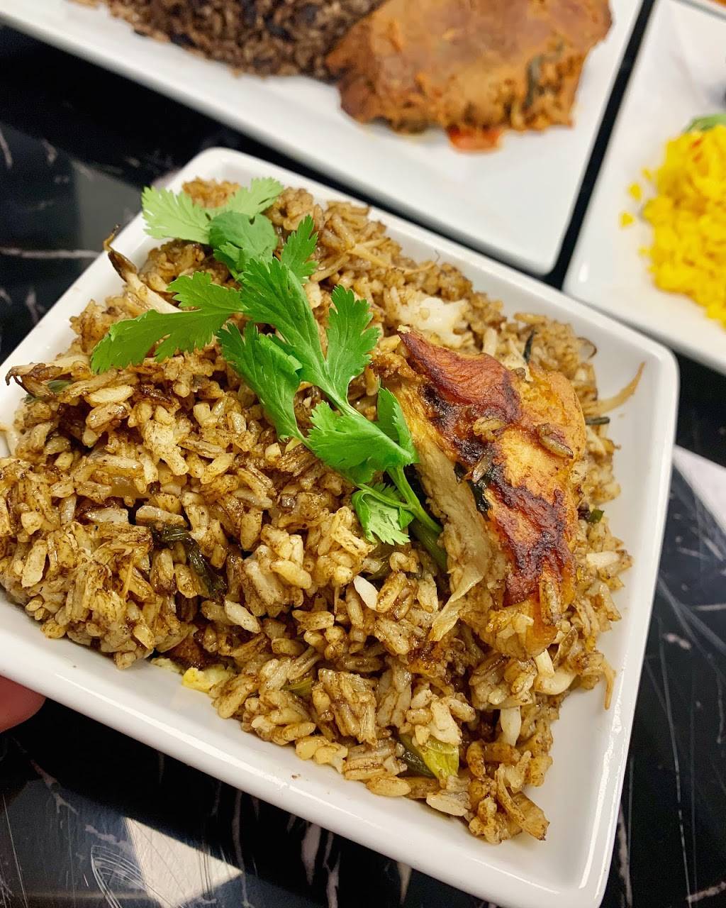 Caribbean Twist | restaurant | 3328 W Columbus Dr, Tampa, FL 33607, USA | 8133509393 OR +1 813-350-9393