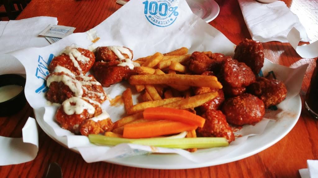 Wild Wing | restaurant | 2051 Winston Park Dr, Oakville, ON L6H 6P5, Canada | 2896442443 OR +1 289-644-2443