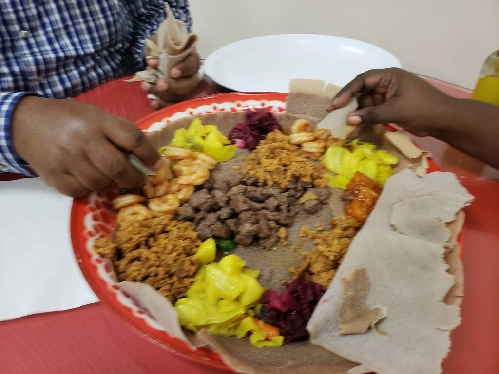 Mitmita Ethiopian Restaurant | restaurant | 4901 W Linebaugh Ave, Tampa, FL 33624, USA | 8134152183 OR +1 813-415-2183