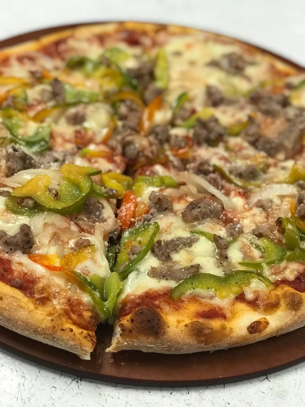 Freedas Pizza & Calzone | restaurant | Parelli Optical, 38 Enon St R, Beverly, MA 01915, USA | 9789690999 OR +1 978-969-0999