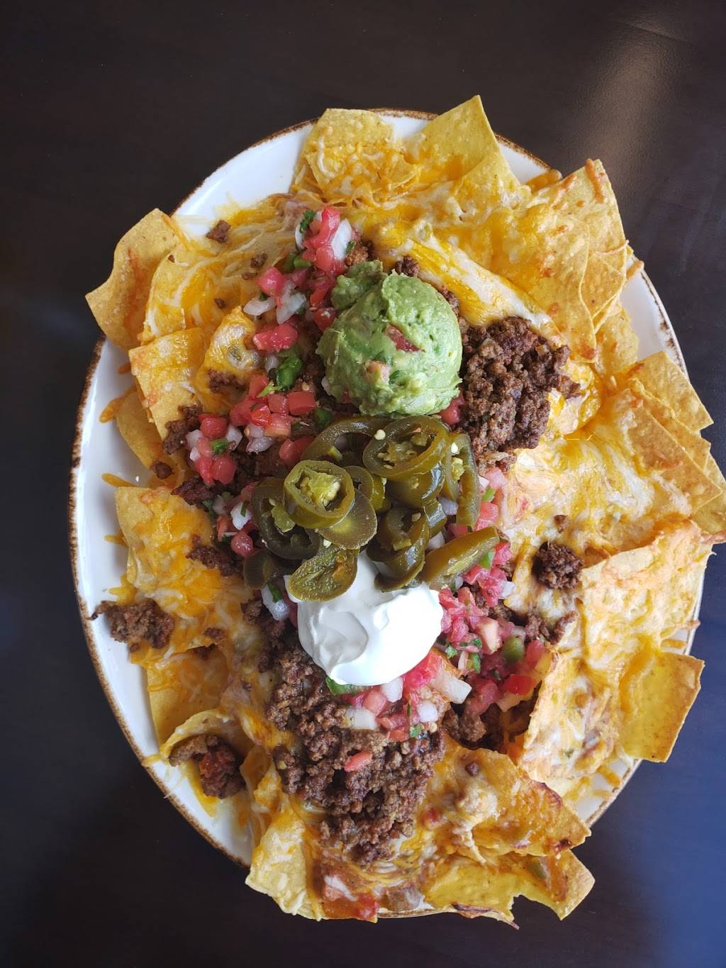 The West Woods Bar & Grill | restaurant | 6655 Quaker St, Arvada, CO 80007, USA | 7208987350 OR +1 720-898-7350