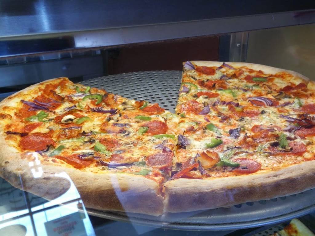 Ginos Pizza | restaurant | 617 Victoria St W, Whitby, ON L1N 0E4, Canada | 8663104466 OR +1 866-310-4466