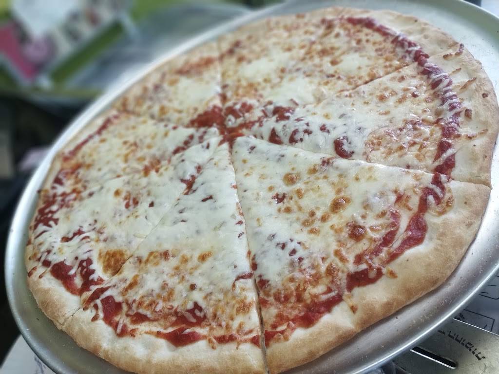 Tatys Pizza | restaurant | 6540 Avenue de Darlington, Montréal, QC H3S 2J3, Canada | 5147348289 OR +1 514-734-8289