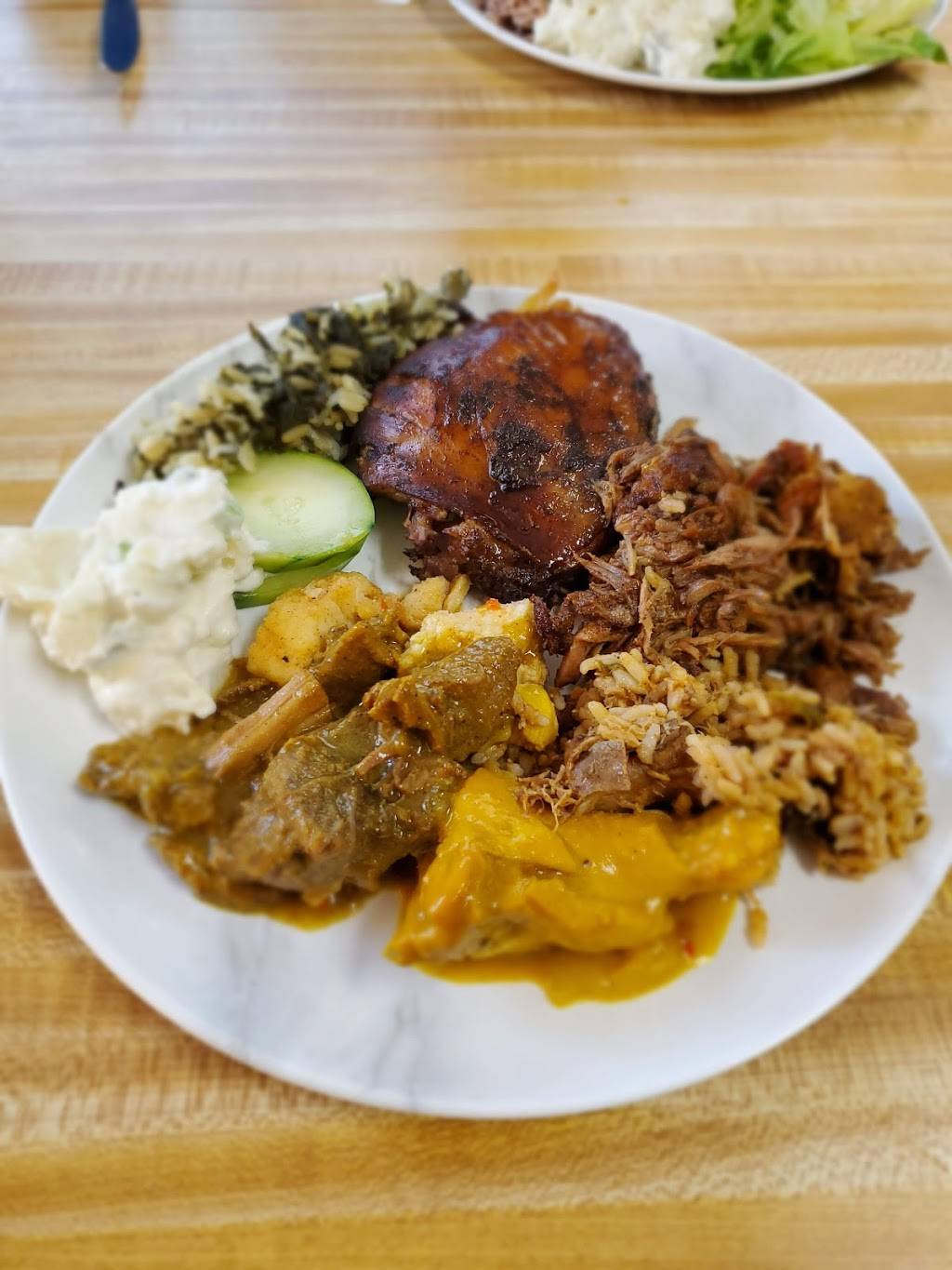 Davids Jamaican Cuisine | restaurant | 5696 Monona Dr, Monona, WI 53716, USA | 6082228109 OR +1 608-222-8109