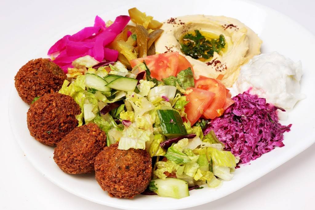 Tahinis Restaurant | restaurant | 595 Fanshawe Park Rd W, London, ON N6G 5B3, Canada | 5196011044 OR +1 519-601-1044