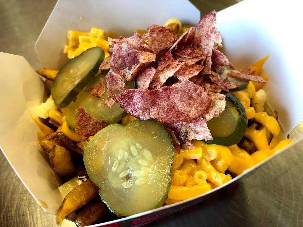 Smokes Poutinerie | restaurant | 85 Resolution Dr, Brampton, ON L6W 0A6, Canada | 9054502922 OR +1 905-450-2922