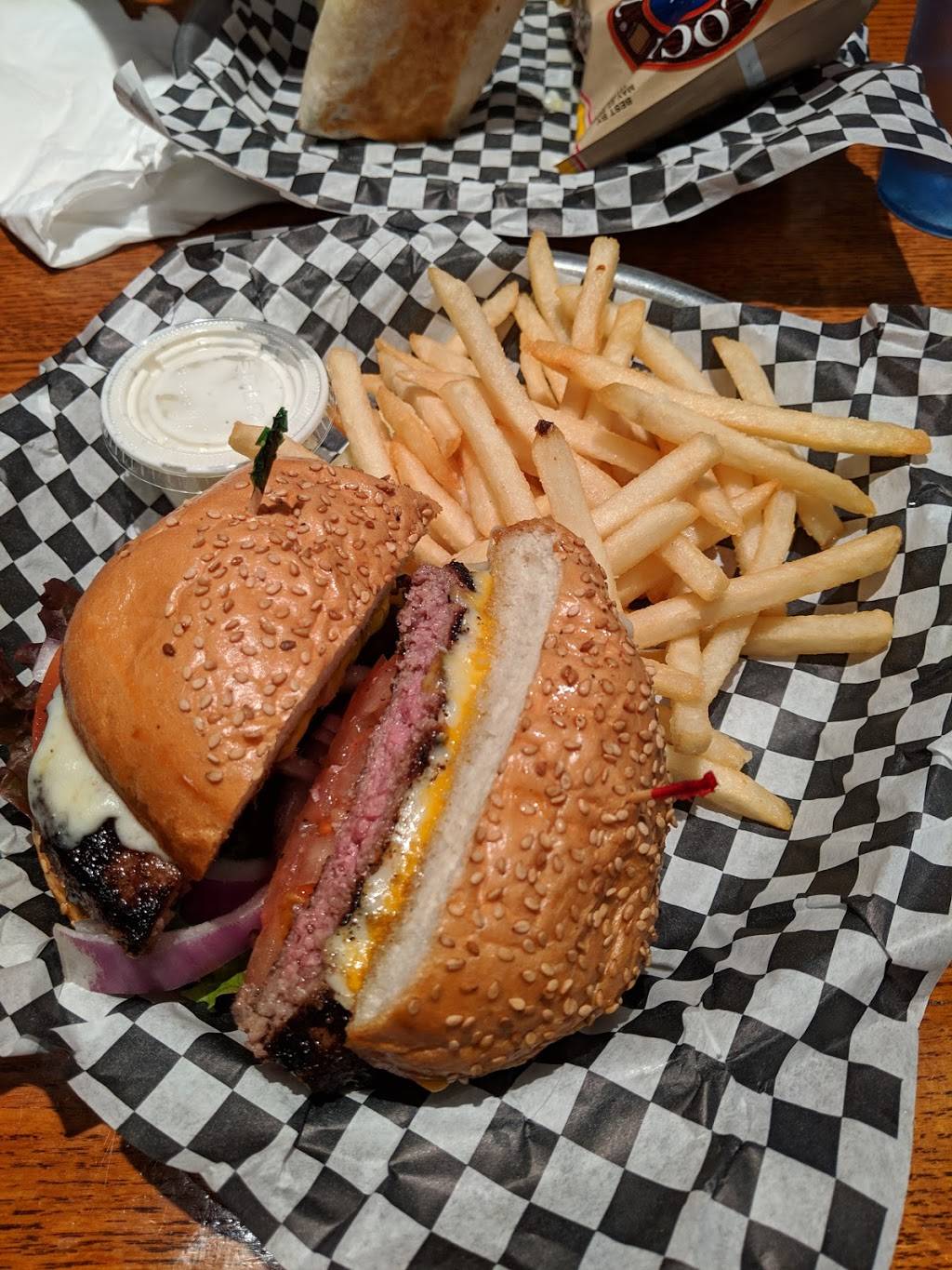 Hooligans Super Bar | restaurant | 2017 E North Ave, Milwaukee, WI 53202, USA | 4142735230 OR +1 414-273-5230