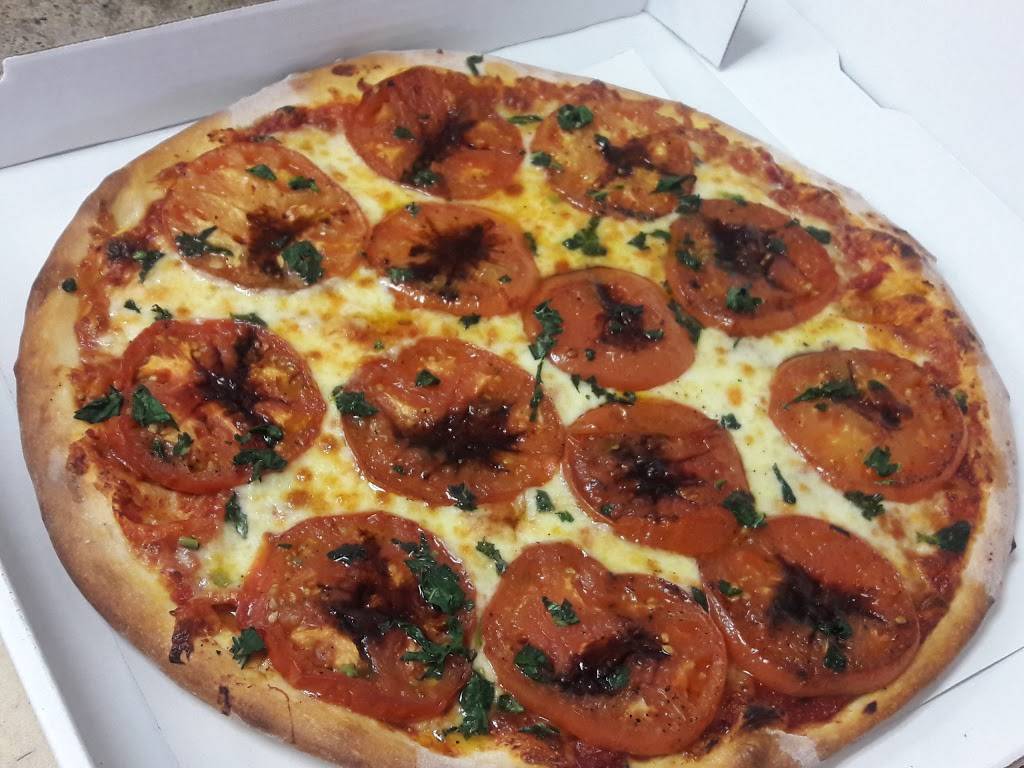 Russos Pizza | restaurant | Chateau Center, 1760 44th St SW, Wyoming, MI 49519, USA | 6165303200 OR +1 616-530-3200