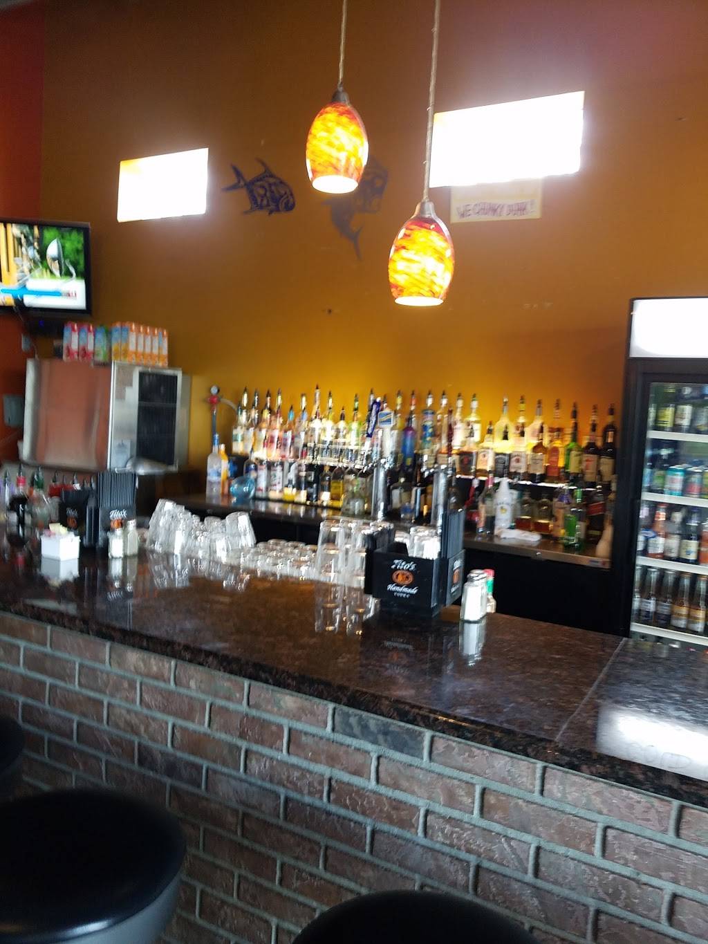 Tiki West Raw Bar and Grill | restaurant | 118 W Ruby St, Tavares, FL 32778, USA | 3525085783 OR +1 352-508-5783