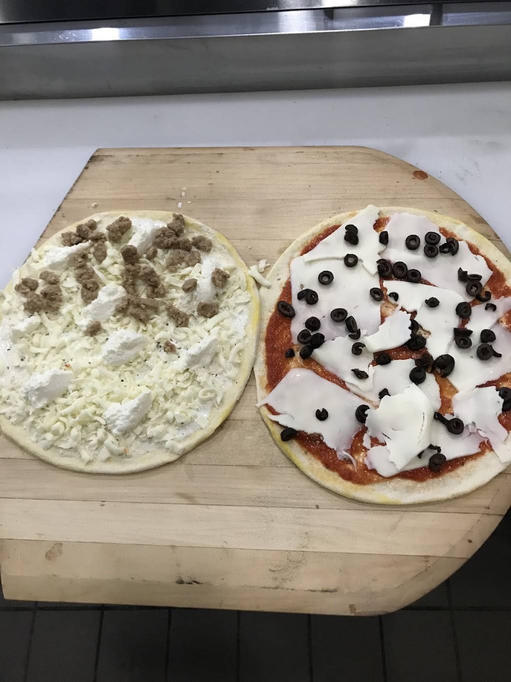 New York Pizza Style | restaurant | 2435 N Clark St, Chicago, IL 60614, USA | 7738571567 OR +1 773-857-1567