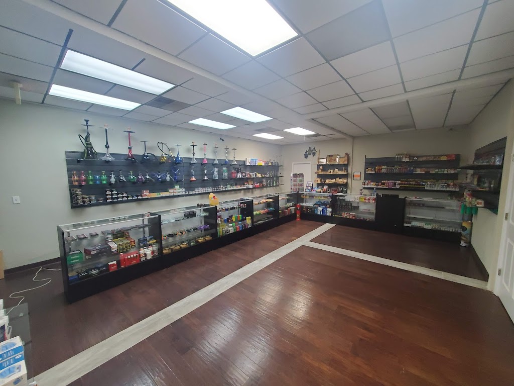 Tobacco and hookah smoke shop | meal takeaway | 607 S Main St Suite 106, Belle Glade, FL 33430, USA | 5617088615 OR +1 561-708-8615