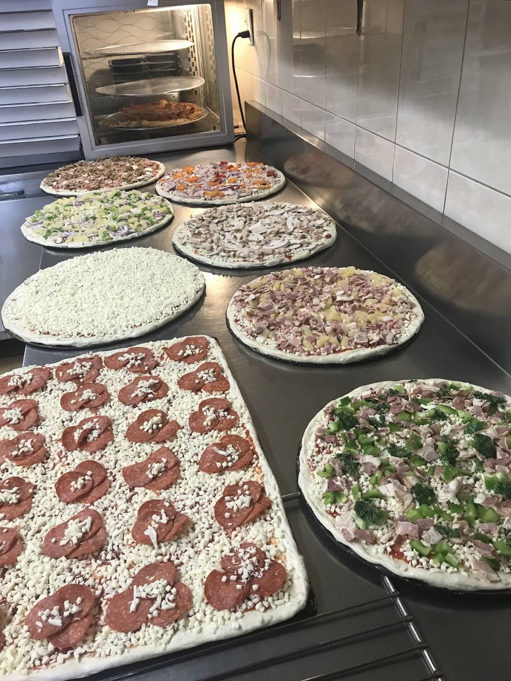 National Pizza & Wings | restaurant | 870 Upper James St, Hamilton, ON L9C 7N1, Canada | 9055754500 OR +1 905-575-4500