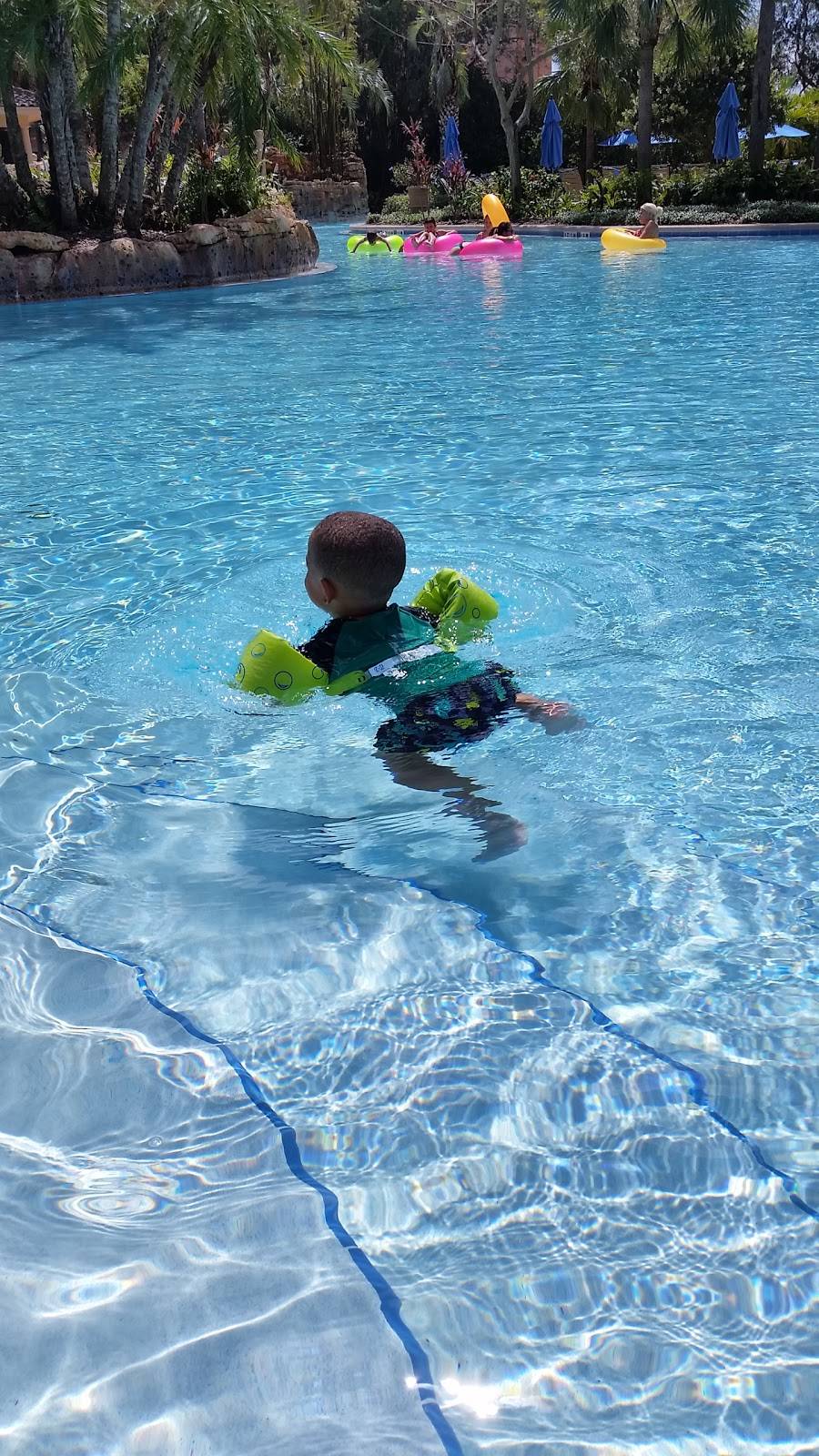 Quench Poolside Bar & Grill | restaurant | 4040 Central Florida Pkwy, Orlando, FL 32837, USA | 4073934777 OR +1 407-393-4777