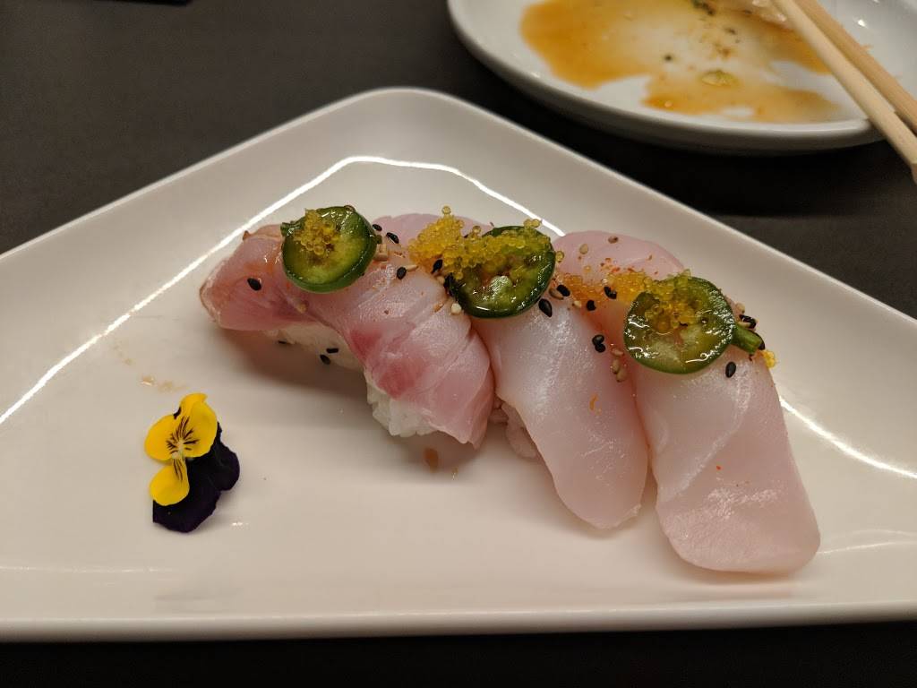 Tsunami Sushi | restaurant | Pan American - 601 Poydras Street Ste B St. Charles & Poydras (enter on, St Charles Ave, New Orleans, LA 70130, USA | 5046083474 OR +1 504-608-3474