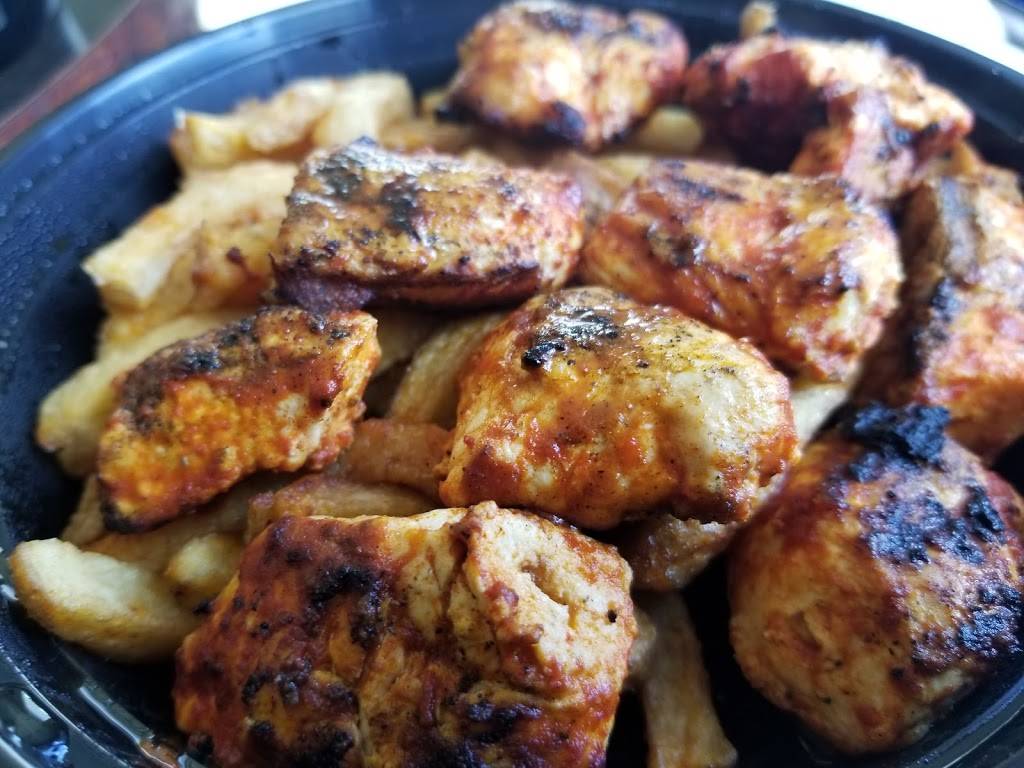 Pili Pili | restaurant | 1960 Lawrence Ave E, Scarborough, ON M1R 2Z1, Canada | 6477487454 OR +1 647-748-7454