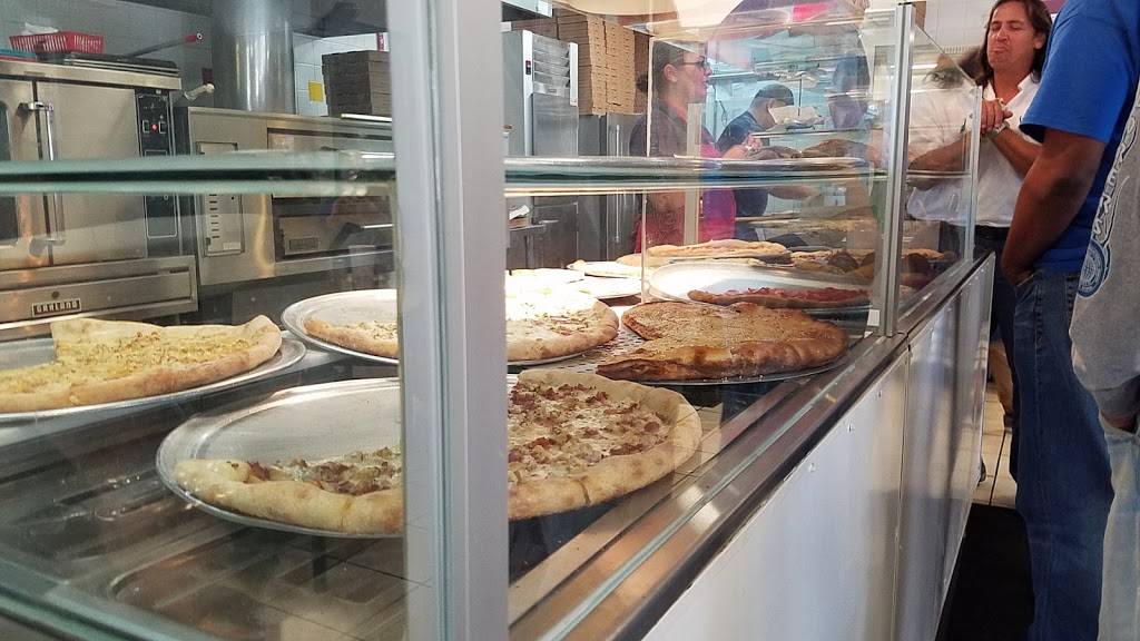 Ninos Pizza & Restaurant | restaurant | 6194 Edgewater Dr, Orlando, FL 32810, USA | 4072537363 OR +1 407-253-7363