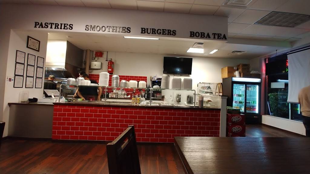 Caribbean Grill & Roti Shop | restaurant | 121 Howland Blvd #103, Deltona, FL 32738, USA | 4075492251 OR +1 407-549-2251