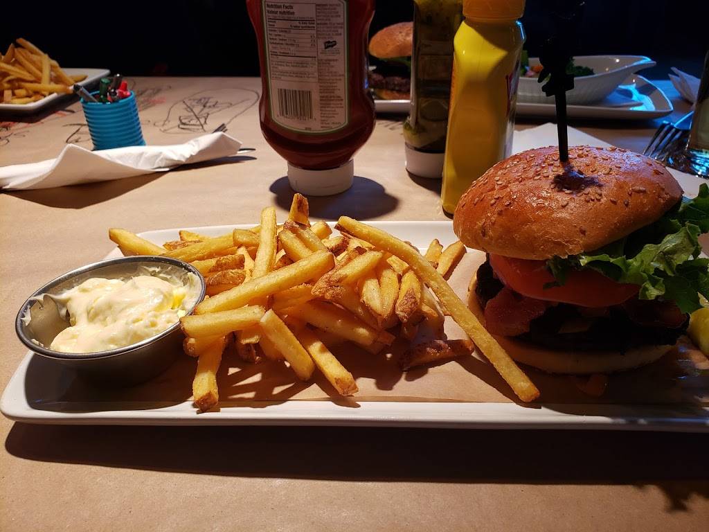 Jack Astors Bar & Grill | restaurant | 1820, av. Pierre-Péladeau local FA01, Laval, QC H7T 2Z1, Canada | 4506816683 OR +1 450-681-6683