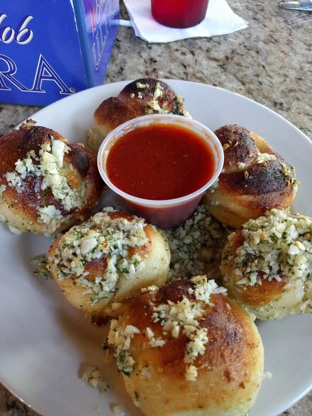 Santos Pizza Restaurant (Brick Oven Pizza) | restaurant | 1319 NE Sunview Terrace, Jensen Beach, FL 34957, USA | 7722618427 OR +1 772-261-8427