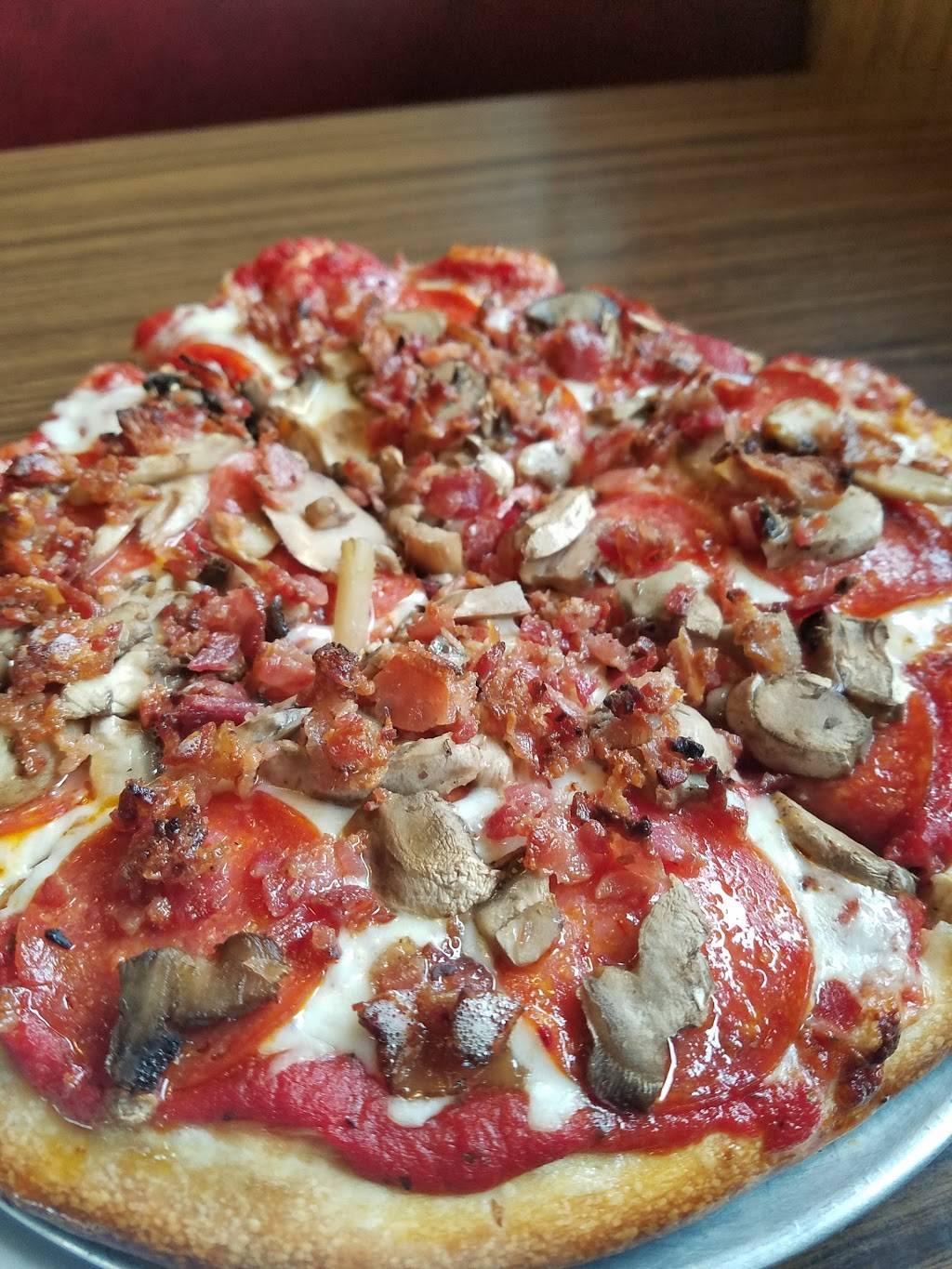 Eddies Pizza Palace | restaurant | 609 N Lafayette St, Greenville, MI 48838, USA | 6167543115 OR +1 616-754-3115