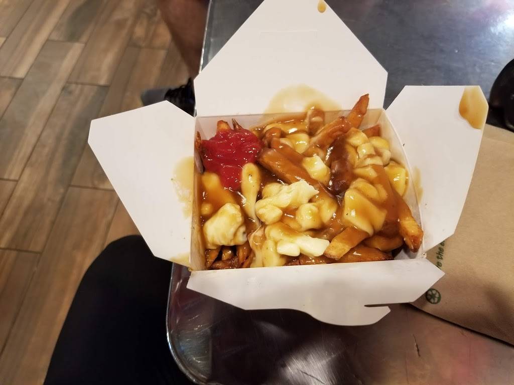Smokes Poutinerie | restaurant | 20 Wyndham St N, Guelph, ON N1H 4E5, Canada | 5197802617 OR +1 519-780-2617