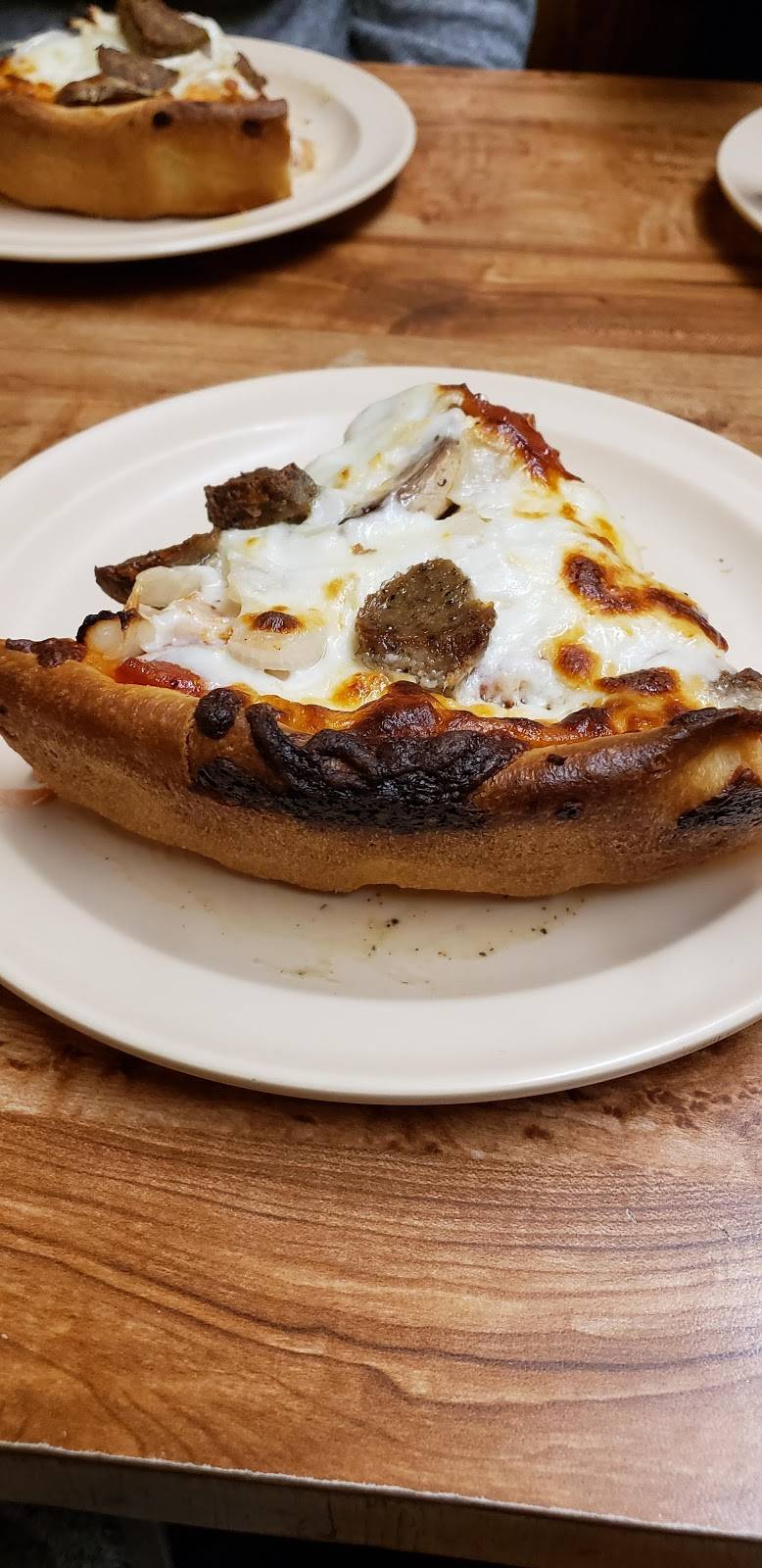 Leonardos Pizza of Millhopper | restaurant | 4131 NW 16th Blvd, Gainesville, FL 32605, USA | 3522755706 OR +1 352-275-5706