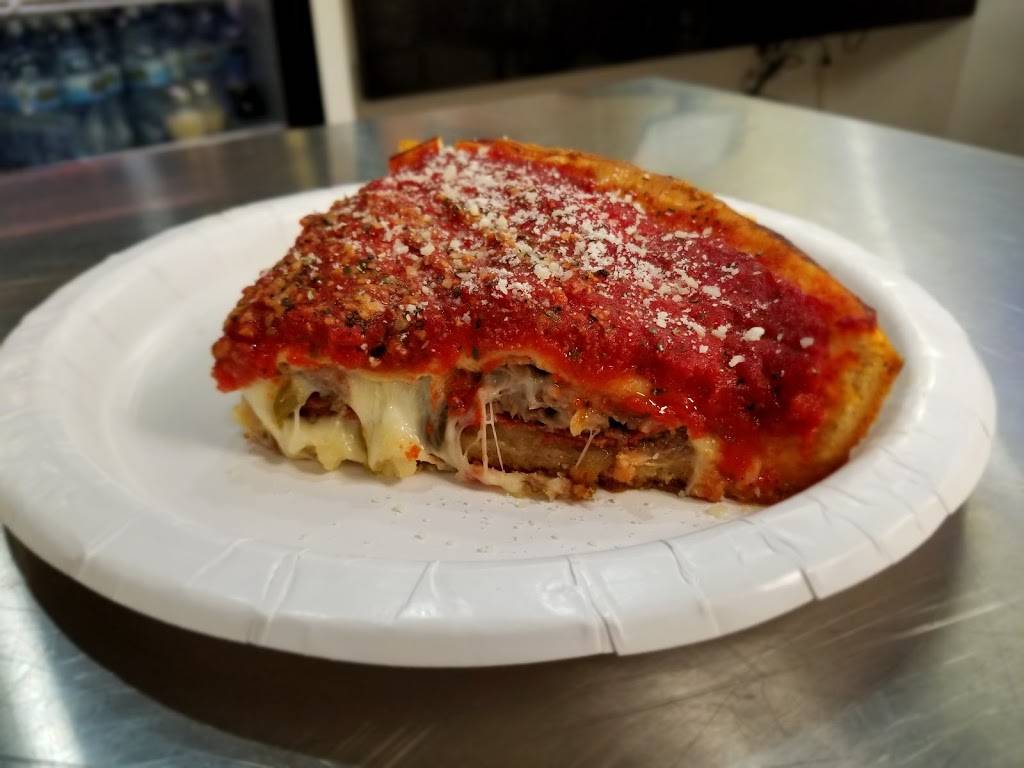 Art of Pizza on State Street | restaurant | 727 S State St, Chicago, IL 60605, USA | 3128775335 OR +1 312-877-5335