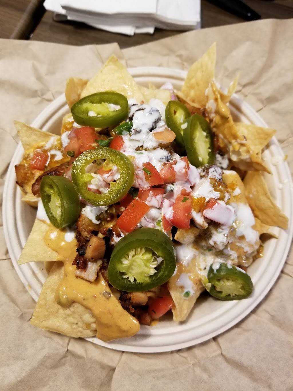 Qdoba Mexican Eats Kitchener | restaurant | 10 Manitou Dr, Kitchener, ON N2C 2N3, Canada | 5198952200 OR +1 519-895-2200