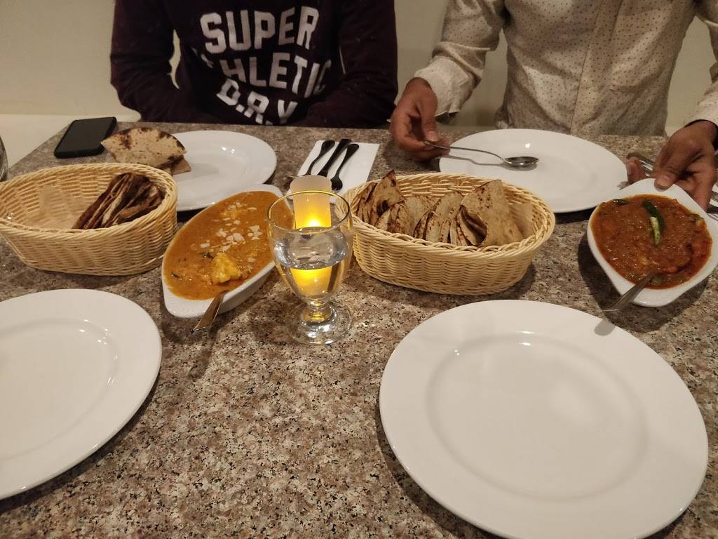 1000 Curry | restaurant | 1525 Centennial Dr, Kingston, ON K7P 0K4, Canada | 6135077423 OR +1 613-507-7423