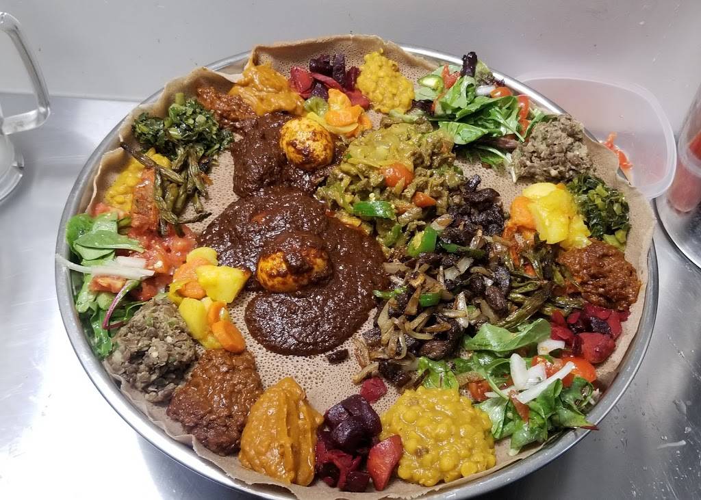 Lucy Ethiopian restaurant | restaurant | 2018 W Washington Blvd, Los Angeles, CA 90018, USA | 3237950869 OR +1 323-795-0869