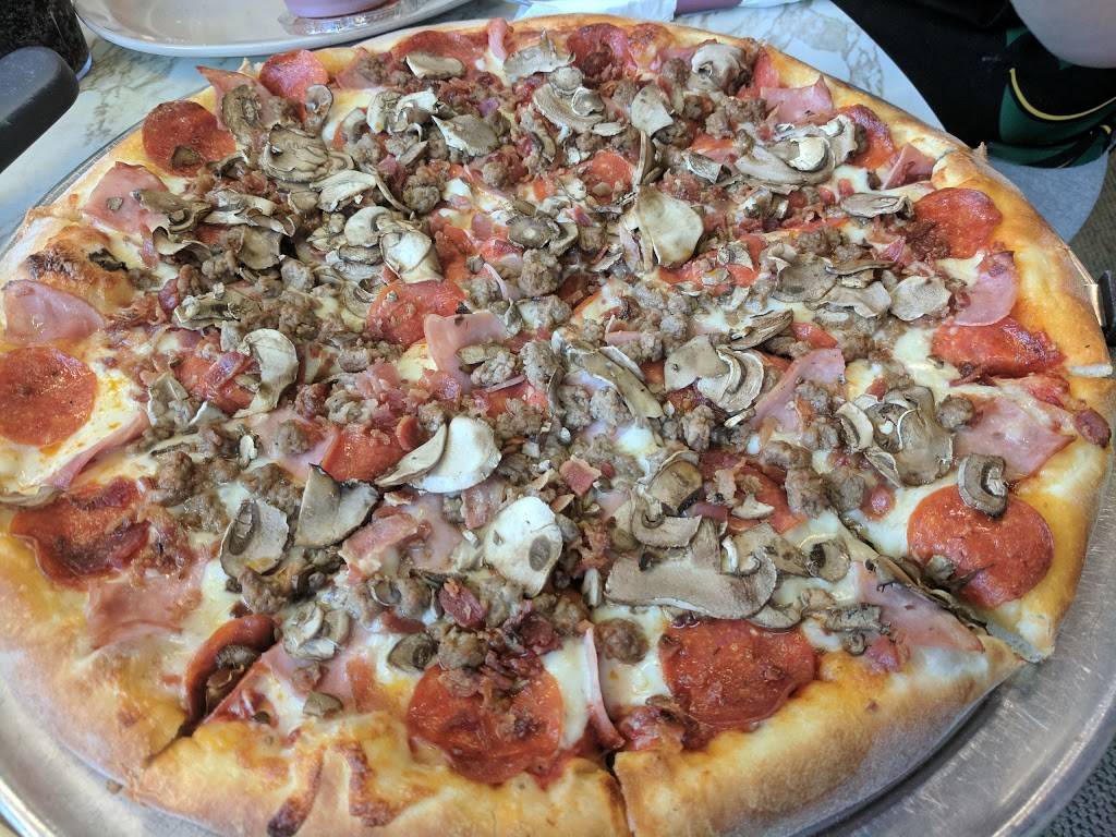 Tims Pizza | restaurant | 102 S Main St, Olivet, MI 49076, USA | 2697492311 OR +1 269-749-2311